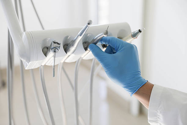 Professional Tooth Extraction technician working in Merkel, TX